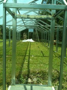 Metal greenhouse structure
